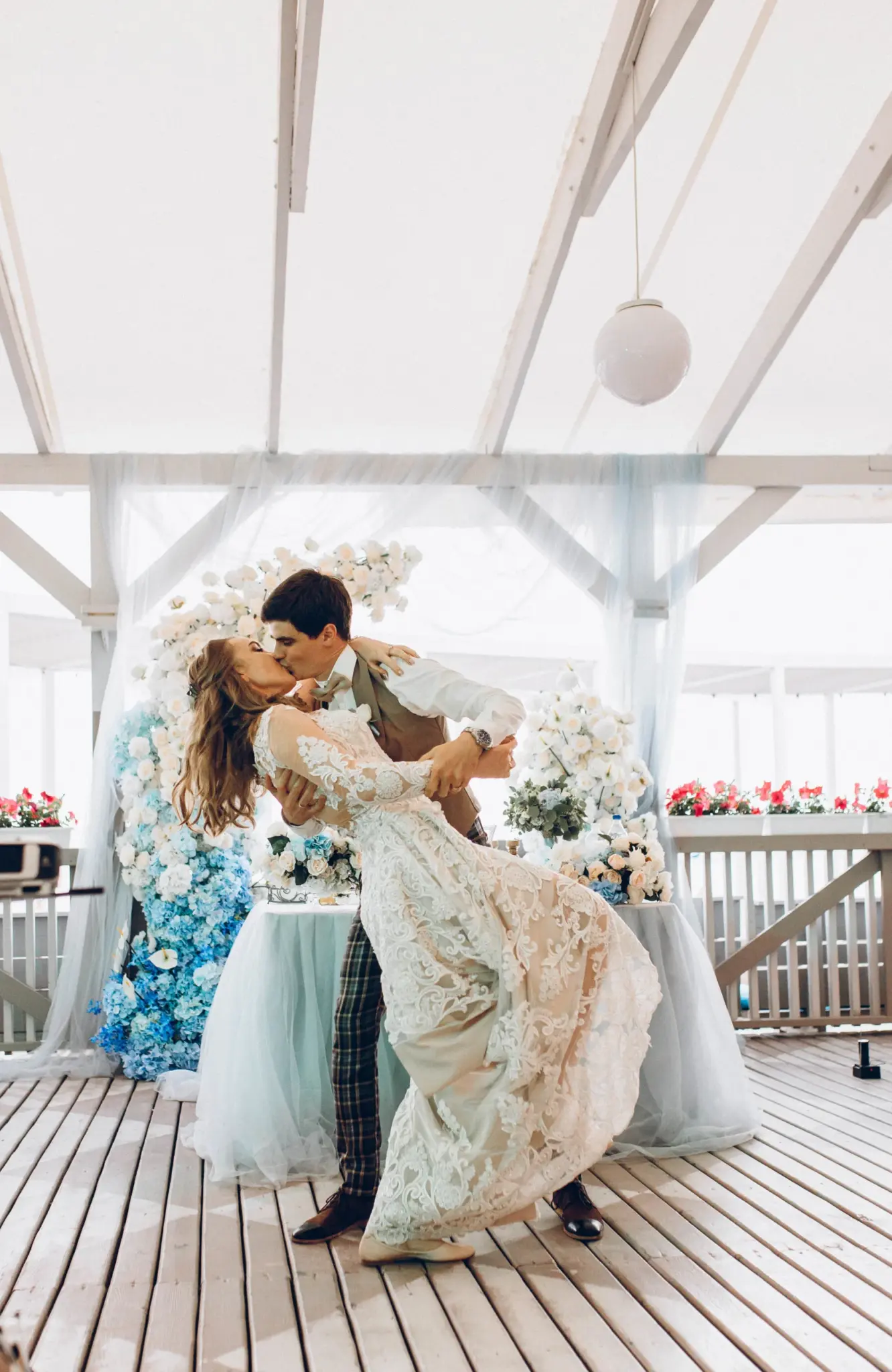 The newlyweds at the reception table