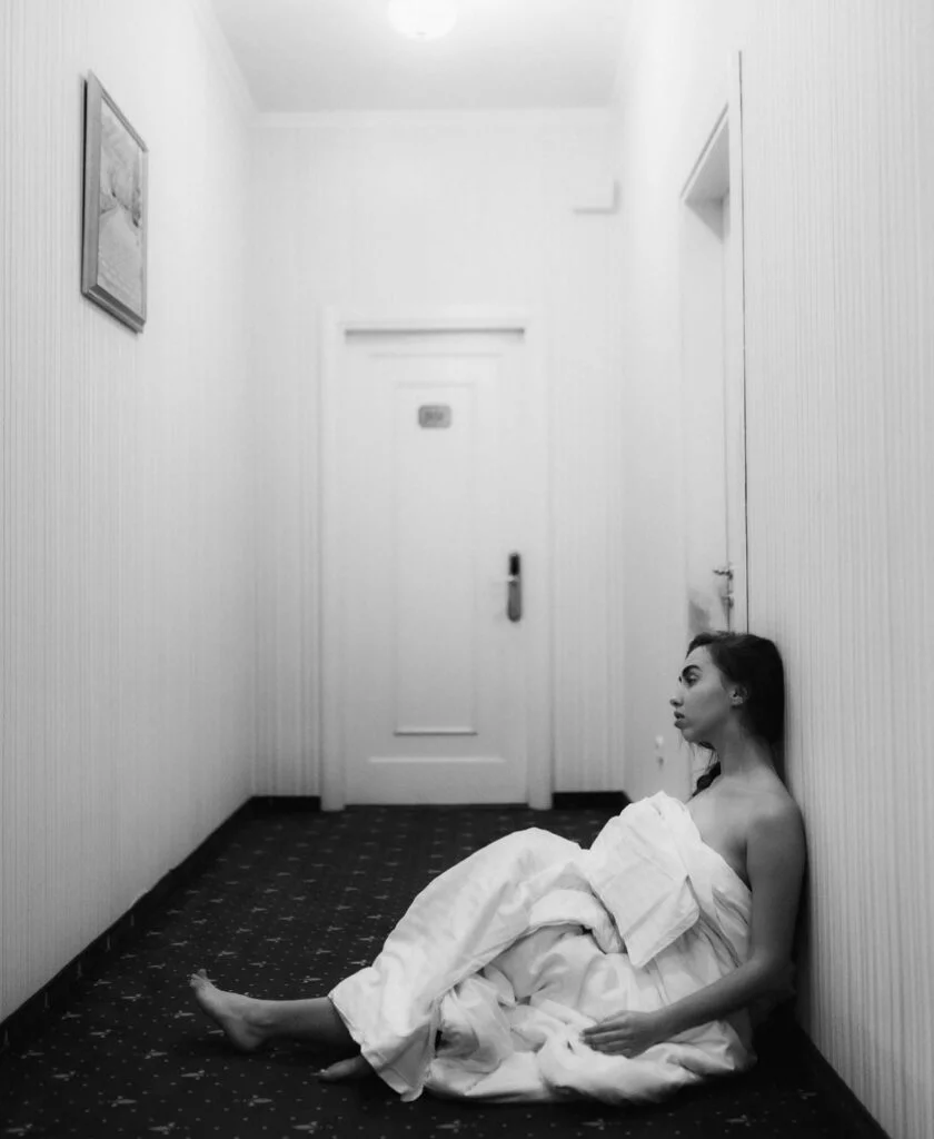Paris boudoir photoshoot in an elegant hotel hallway by Julia Litvin