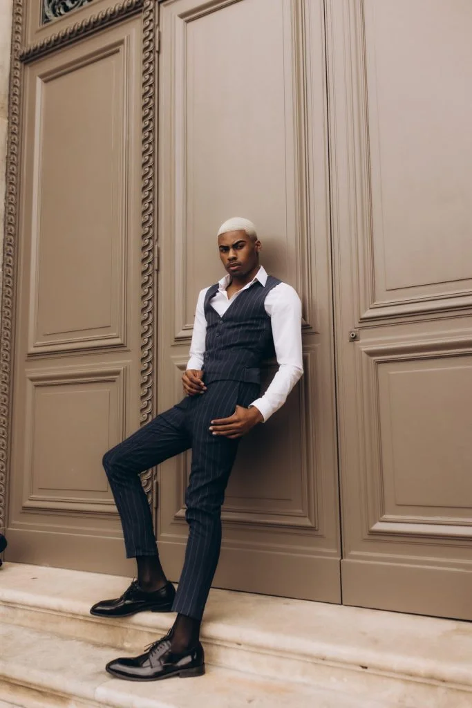 Male fashion photoshoot in Paris in a pinstripe waistcoat by Julia Litvin