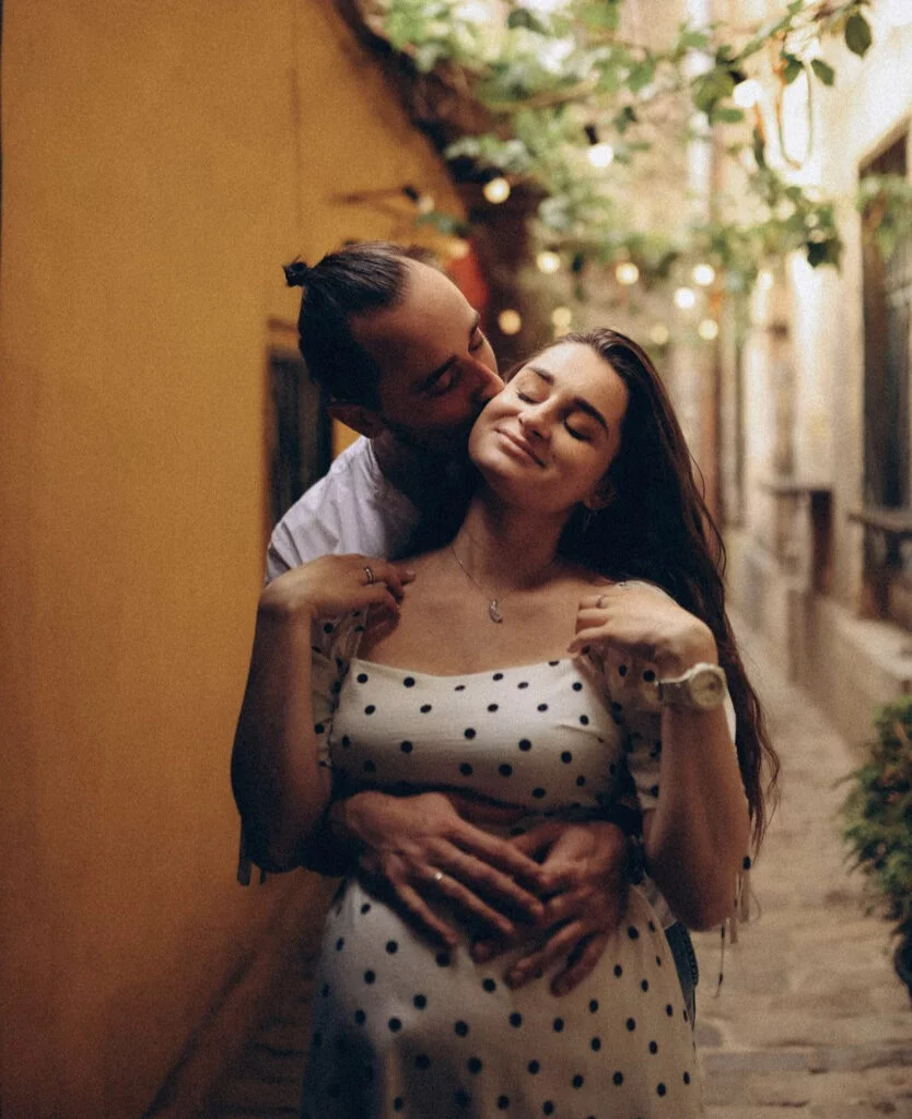 Evening maternity photoshoot in Paris on in a charming lit alley