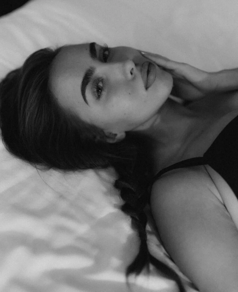 Elegant boudoir photography in Paris, soft black and white close-up portrait by Julia Litvin