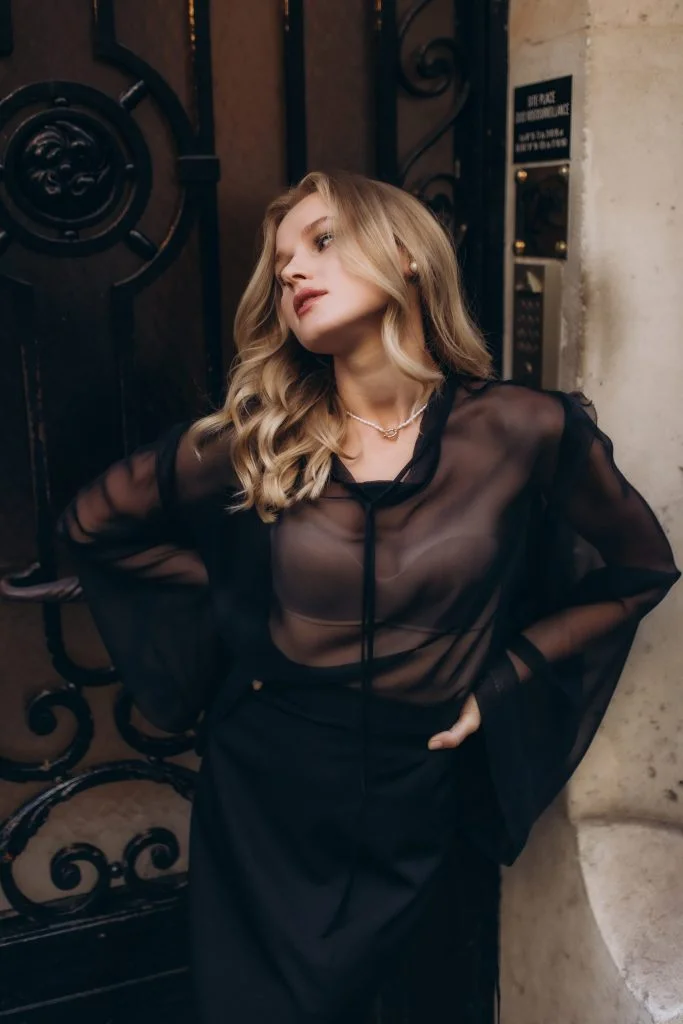 Fashion photographer in Paris shoot in a sheer black blouse by Julia Litvin