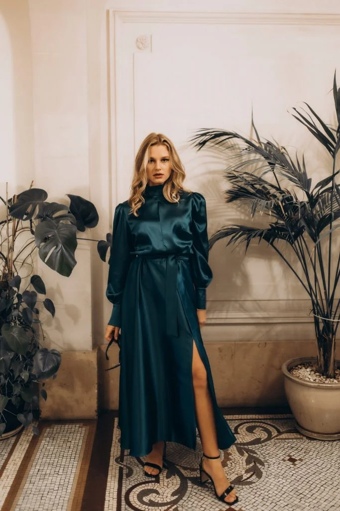 Fashion photoshoot in Paris in an emerald satin dress by Julia Litvin