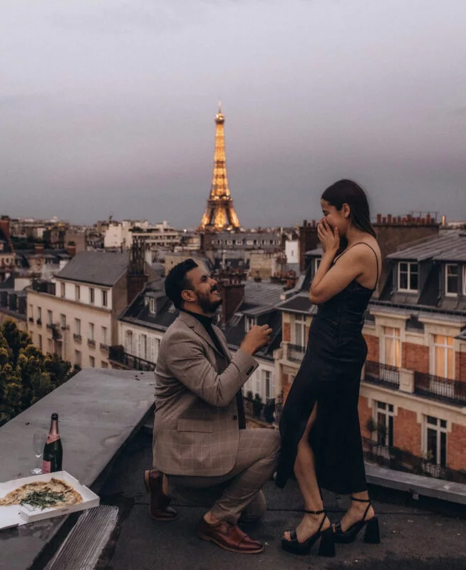 Rooftop proposal photoshoot in Paris with the Eiffel Tower at dusk - photo Litvin Julia