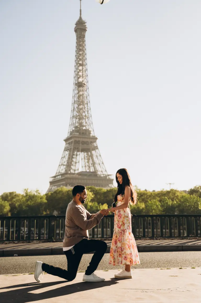 Hidden photographer captures a proposal on one knee by the Eiffel Tower
